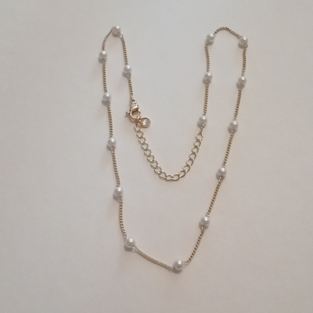 #1110. 5 Piece Assorted Gold Toned Pendant And Faux Pearl Necklace Bundle - Picture 9 of 10